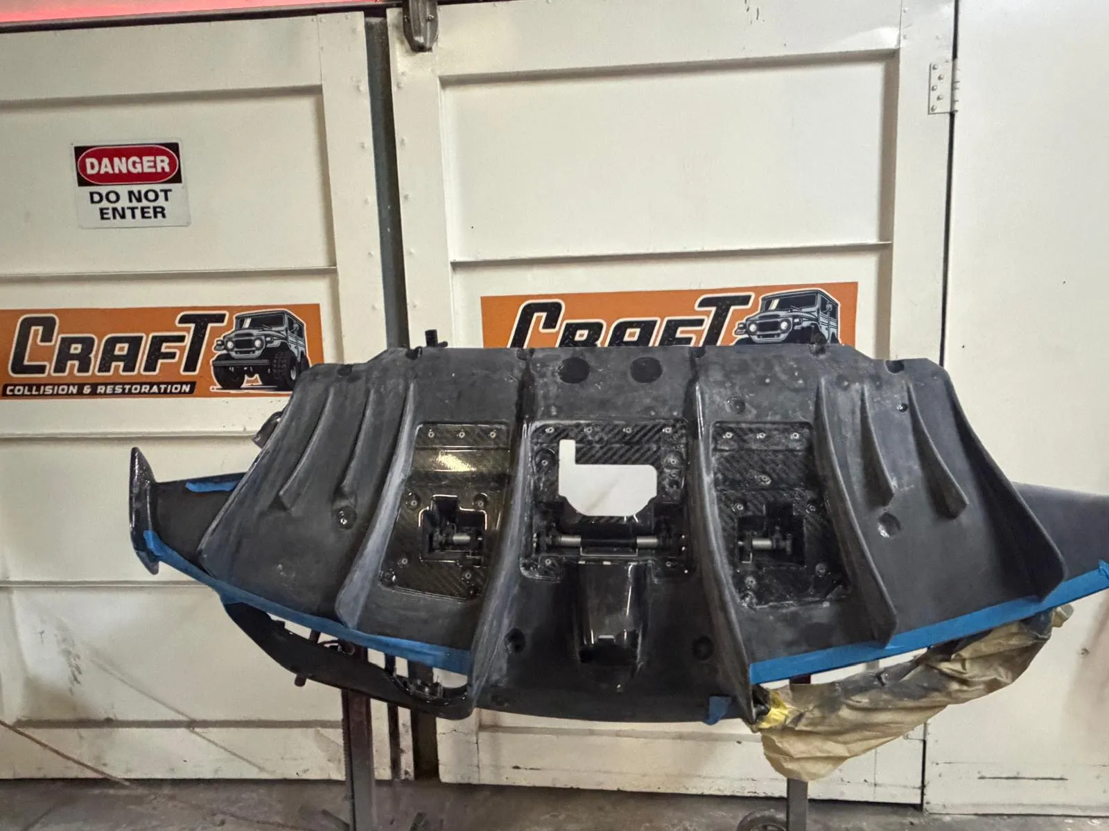 Large carbon fiber rear diffuser fabricated in house at Craft Collision