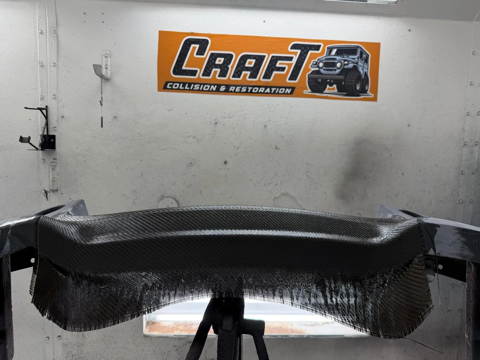 Carbon fiber rear wing fabricated in house at Craft Collision in Lake Worth Beach