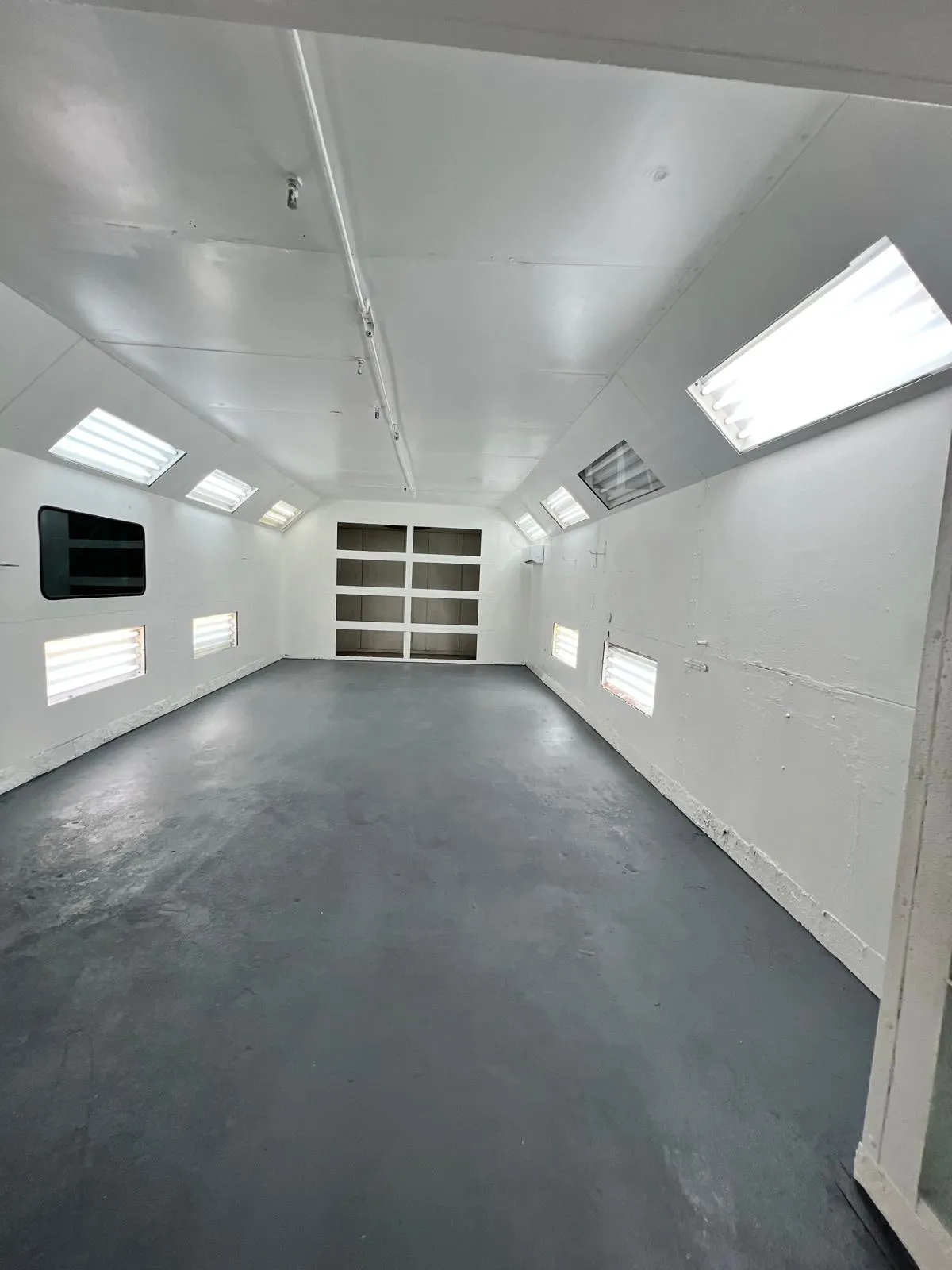 Interior of the paint booth at Craft Collision in Lake Worth Beach