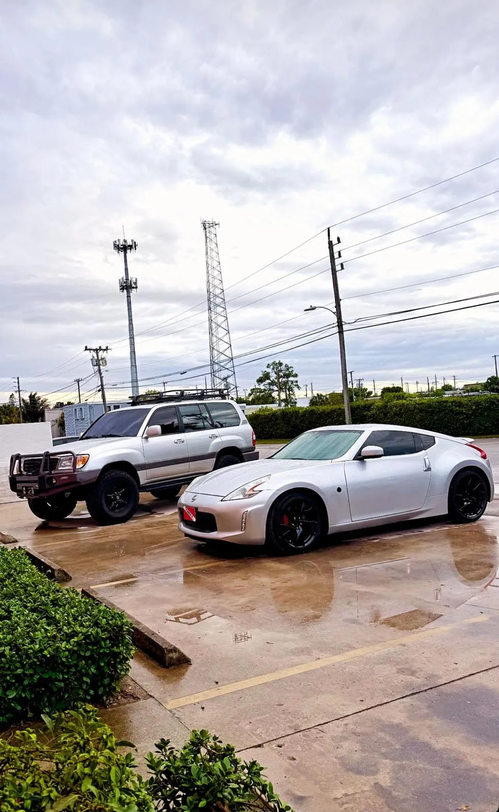 Customer vehicles parked outside Craft Collision in Lake Worth Beach, Florida