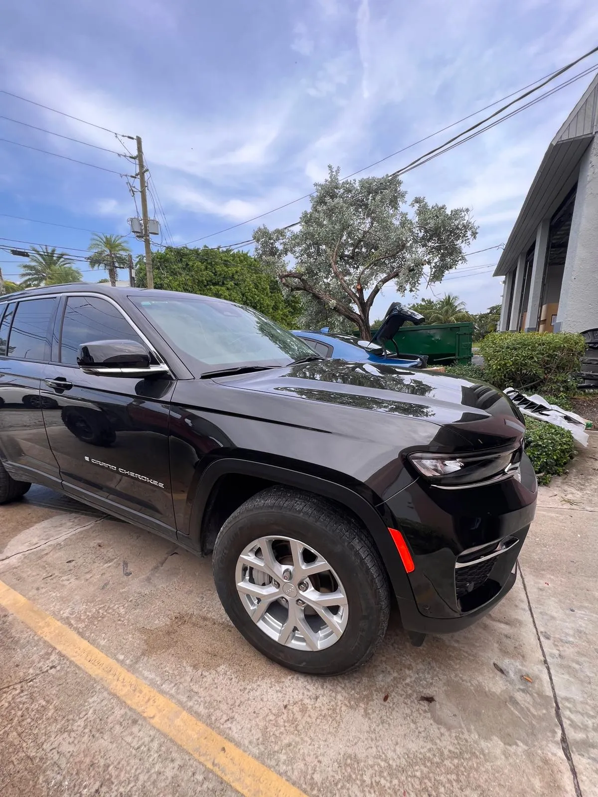 Black Jeep Grand Cherokee finished after front-end collision repair at Craft Collision